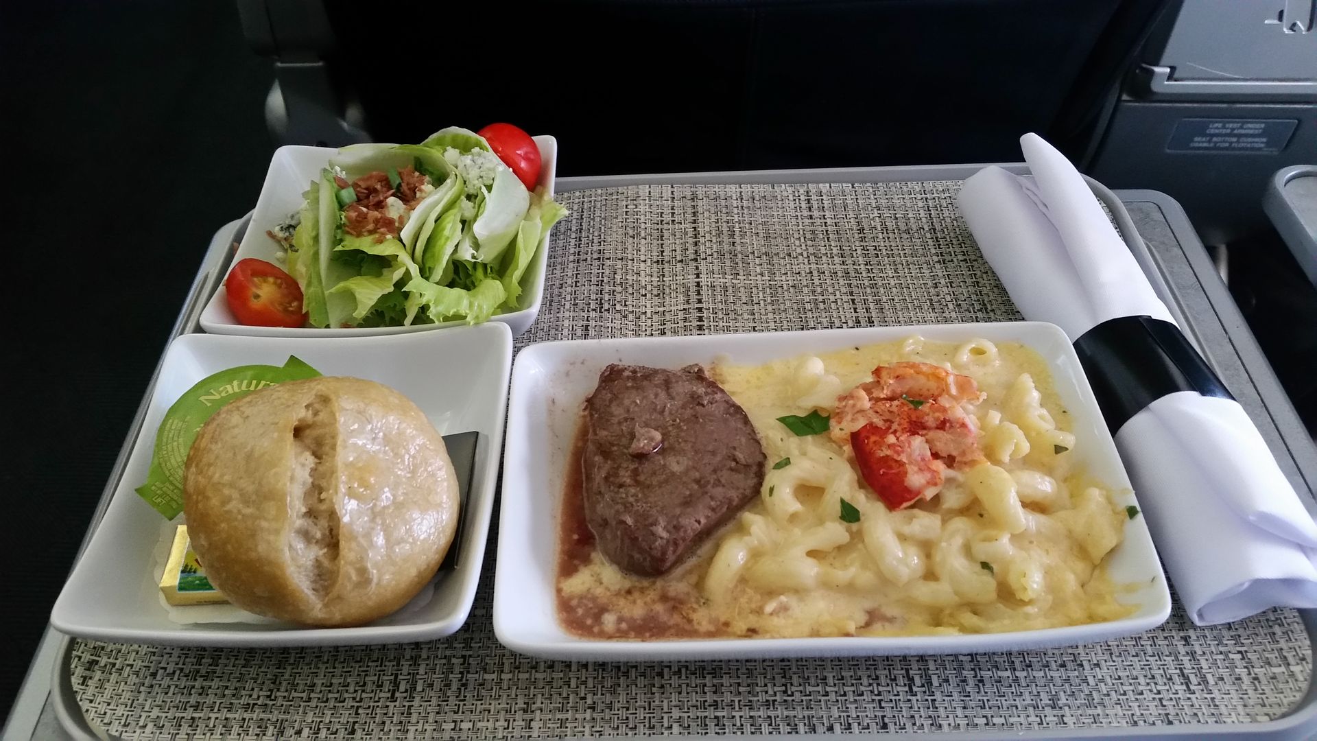 domestic airlines american class meals dinner cheese yes bad really lobster steak mac august october